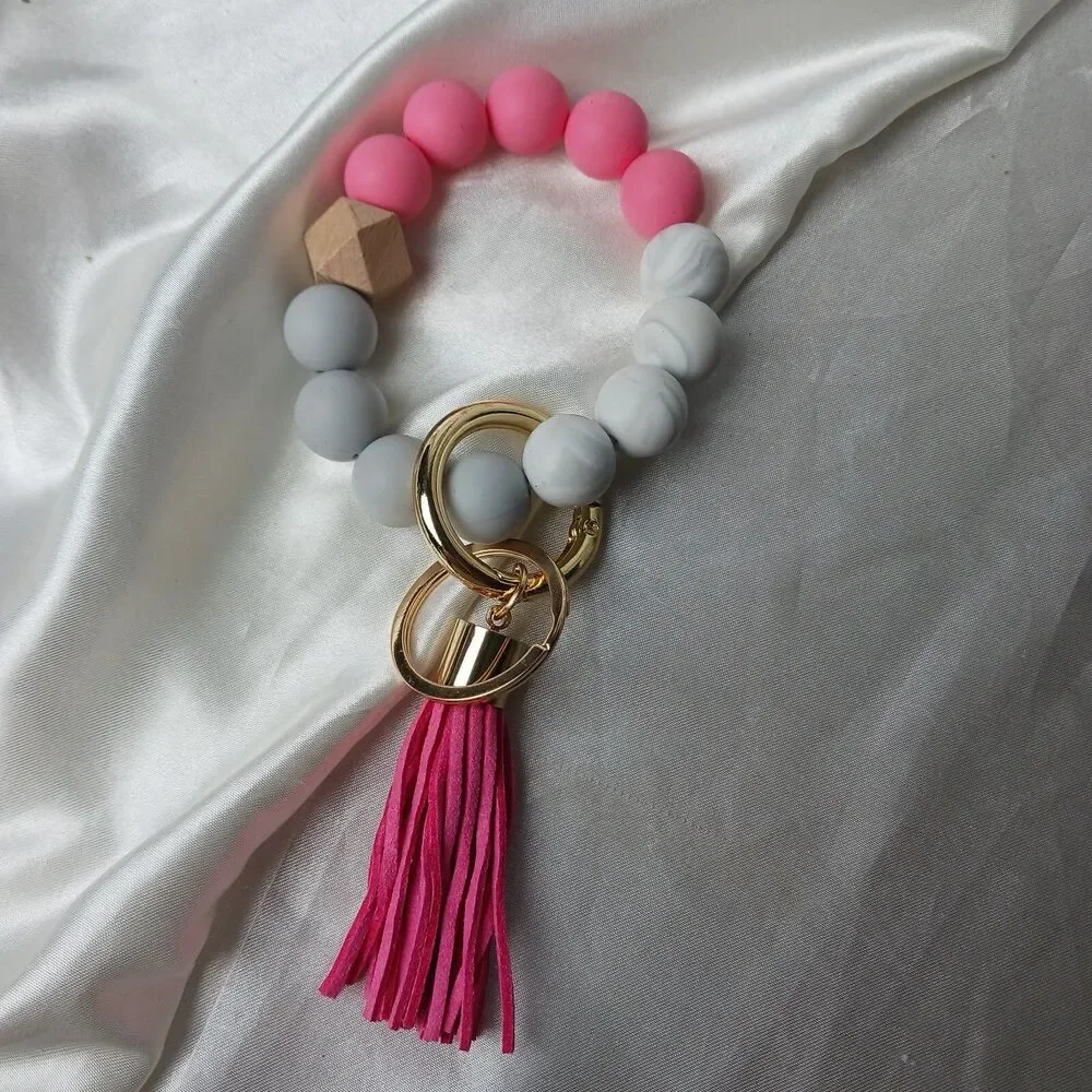 PINK BRACELET KEYCHAIN WITH TASSEL