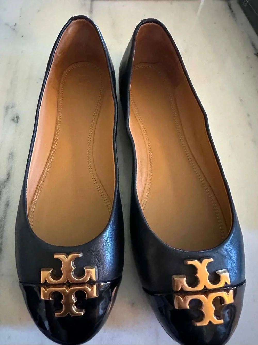 Tory Burch Black Leather Ballet Flats  Contact me at: 985-758-9360