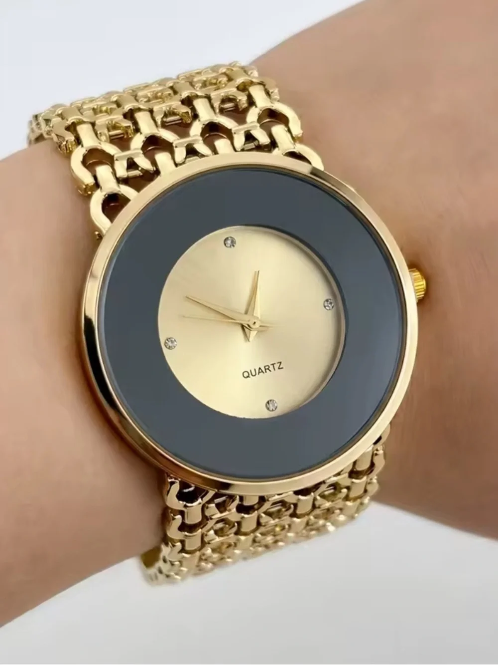 Anthropologie Gold and Black Round Quartz Bracelet Watch