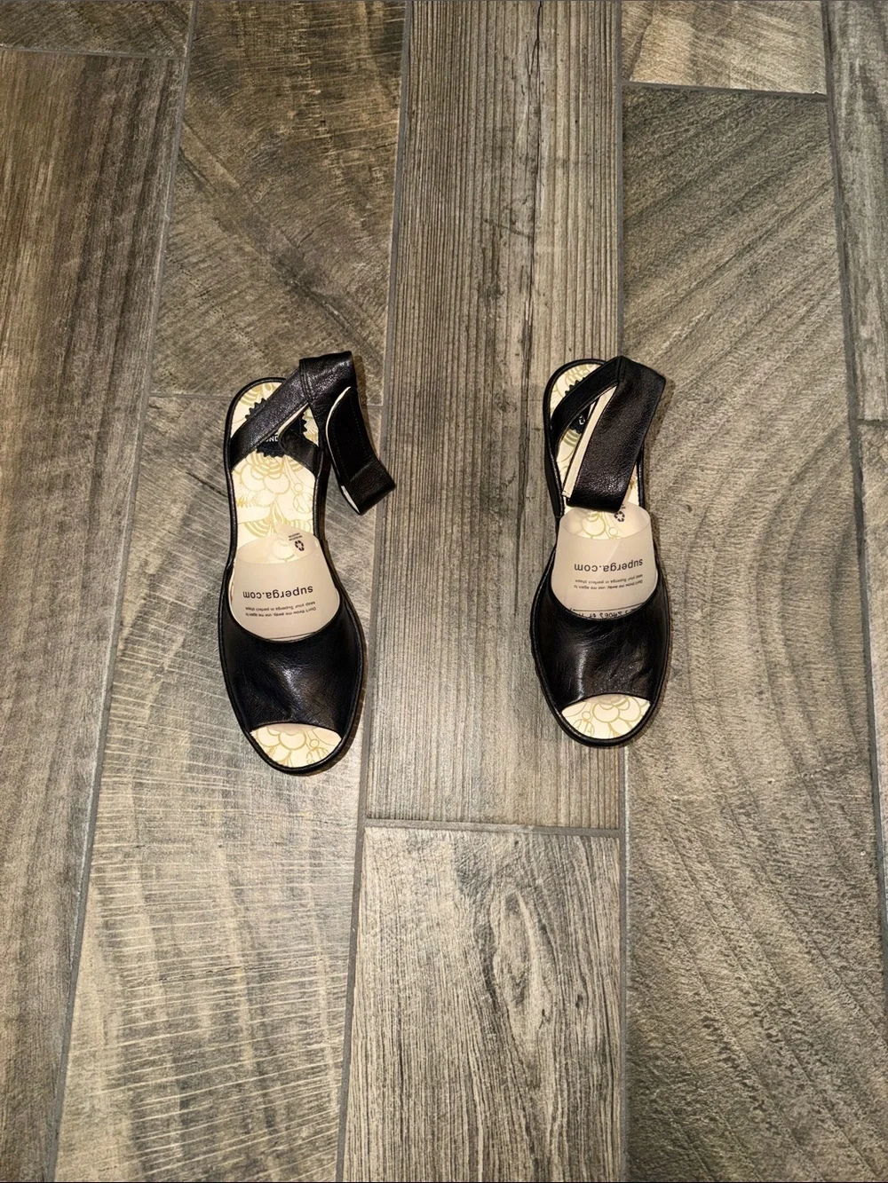 Fly London modern wedge