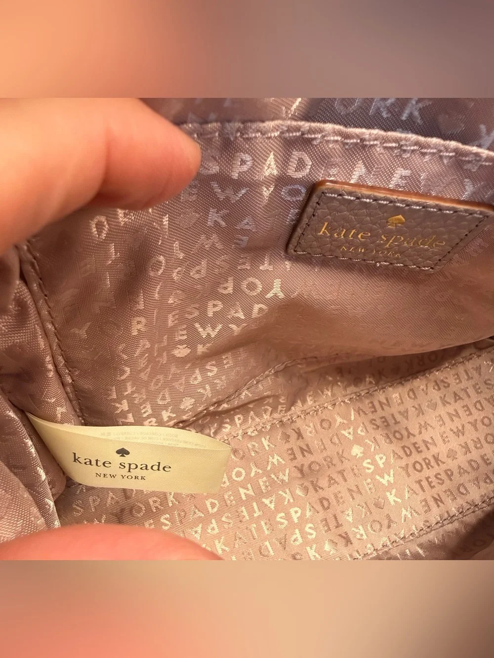 kate spade plaque wear marks