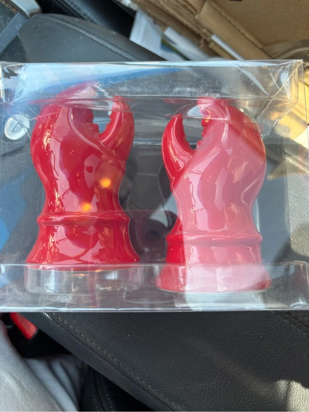 Lobster salt and pepper shakers and a lobster bottle opener