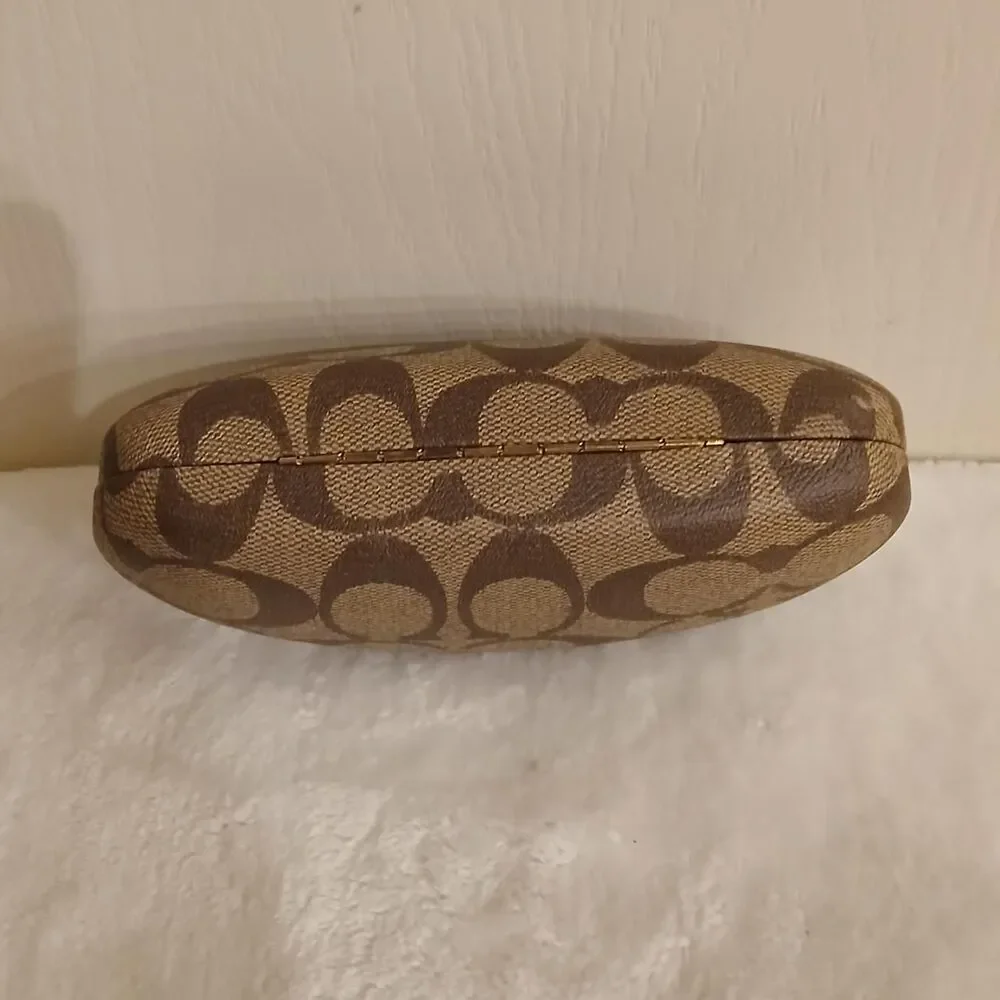 Coach clam shell