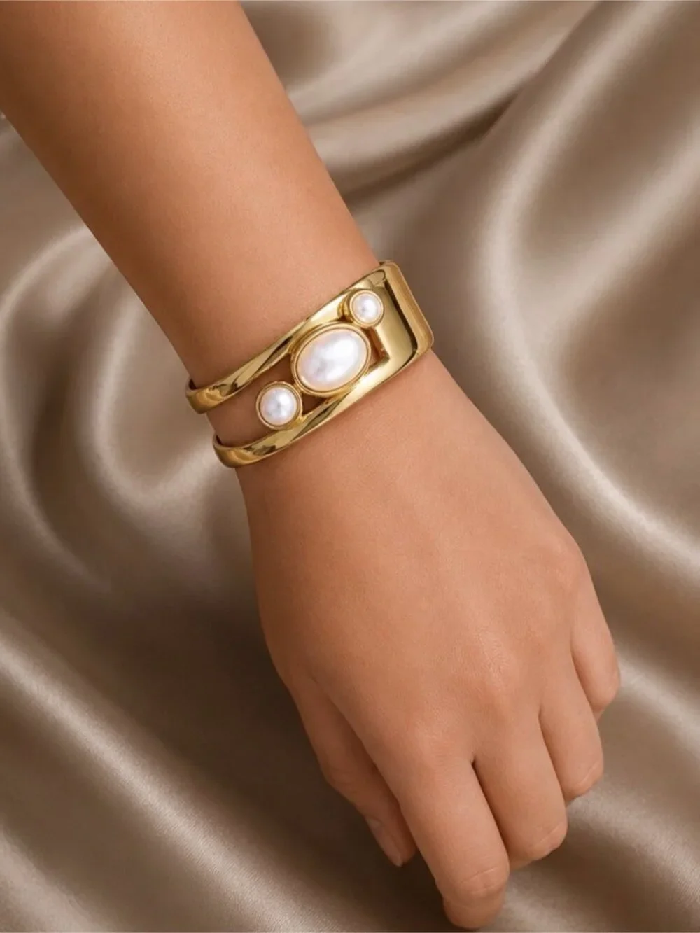 Anthropologie sleek gold