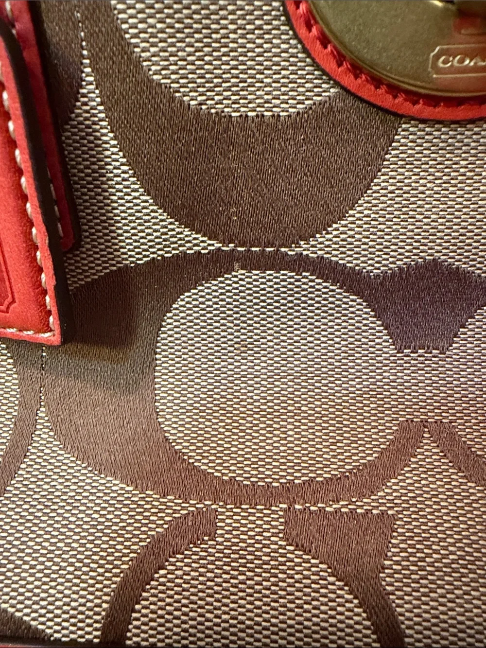 Coach satchel signature