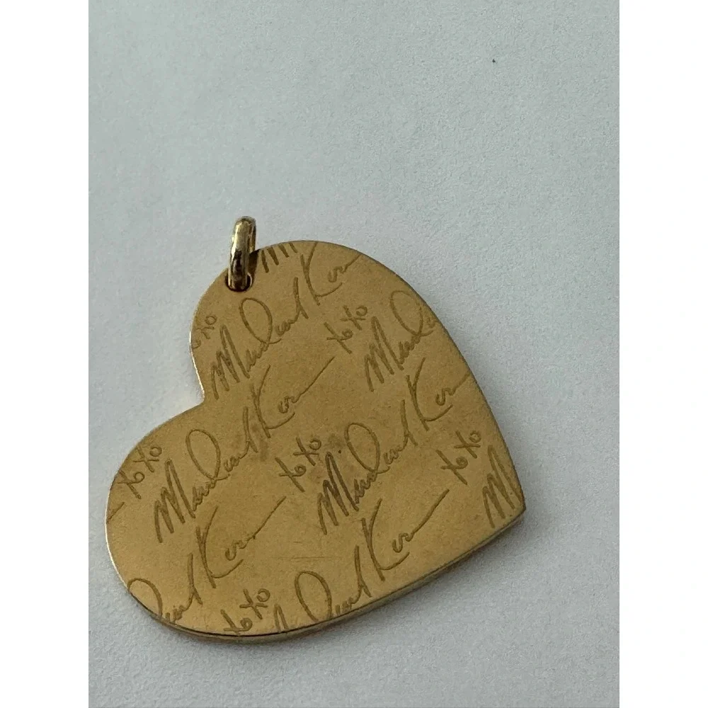 Michael Kors gold tone