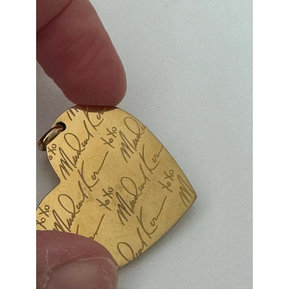Michael Kors gold tone
