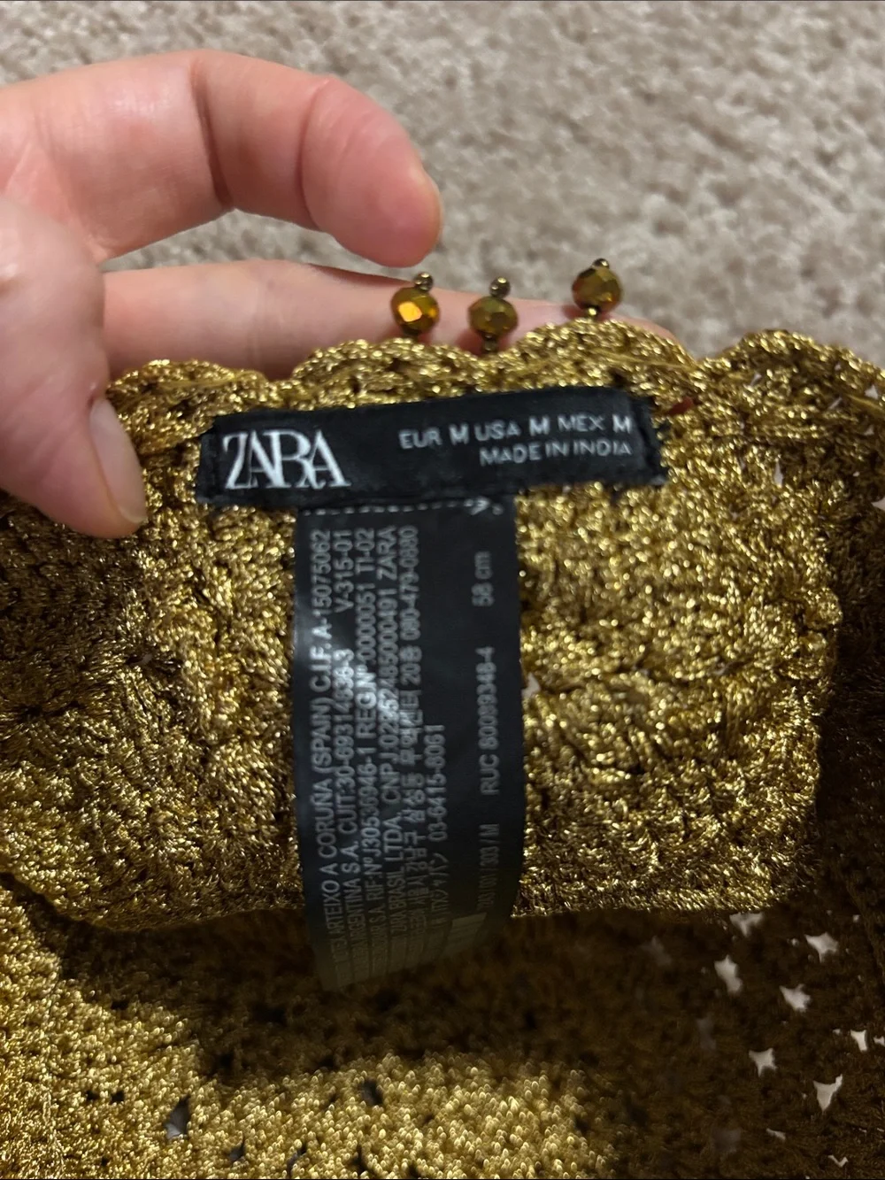 Zara shimmering gold