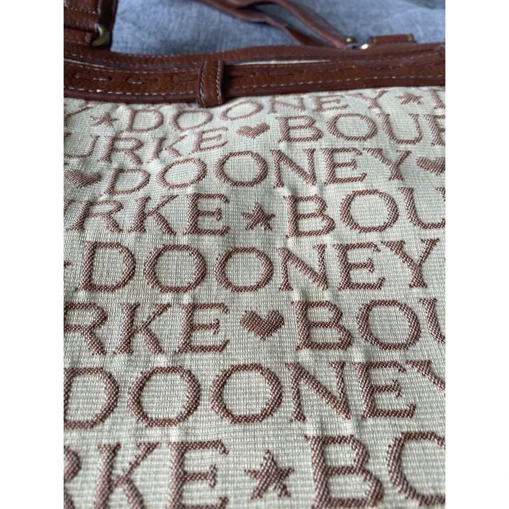 Dooney & Bourke signature wear tone