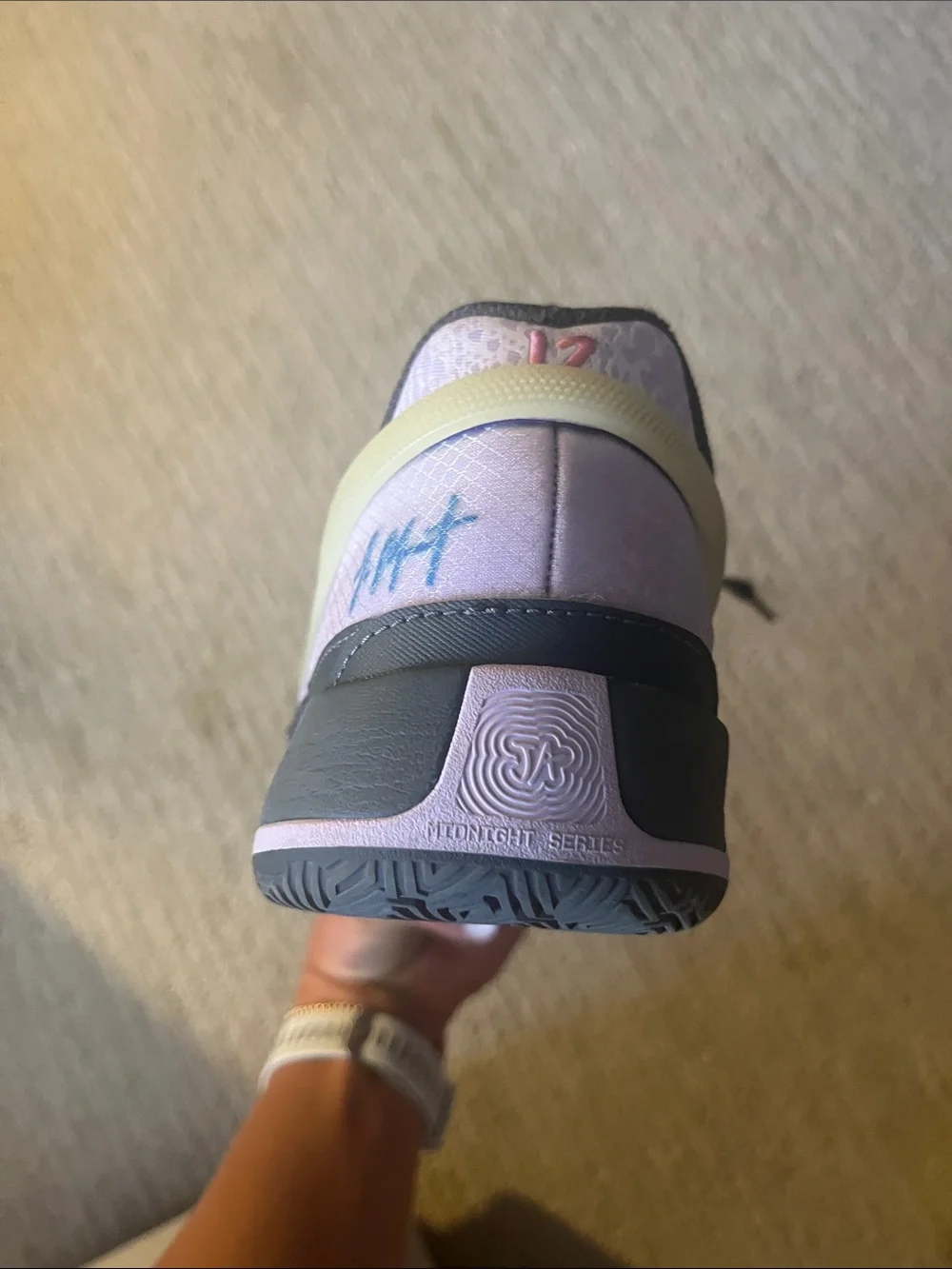 Nike Kids Black basketball shoes with Lavender and Pale Yellow Accents