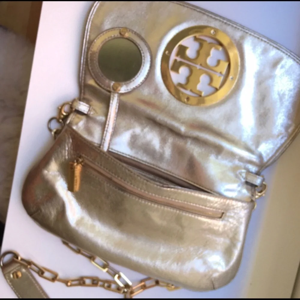 Tory Burch reposhing this