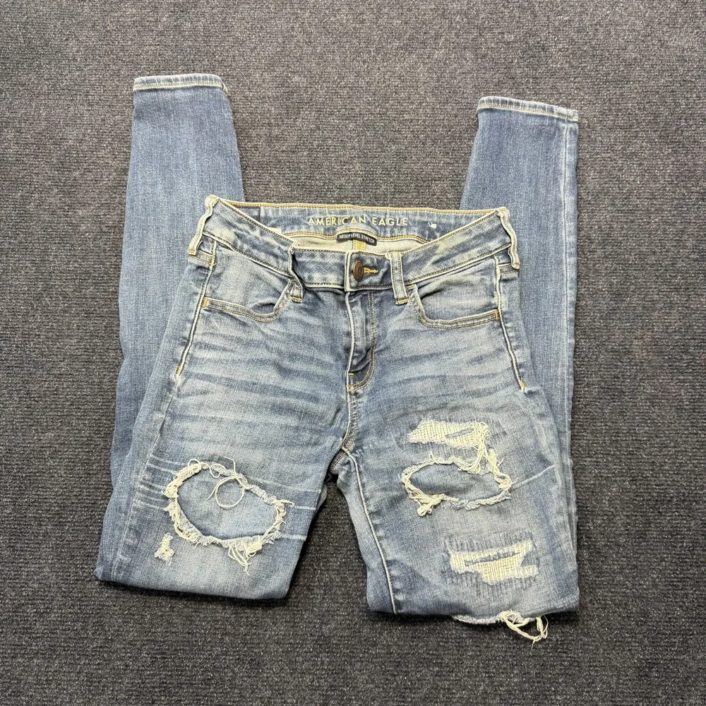 American Eagle Jegging Jeans Womens 4 Light Wash Ripped Next Level Stretch