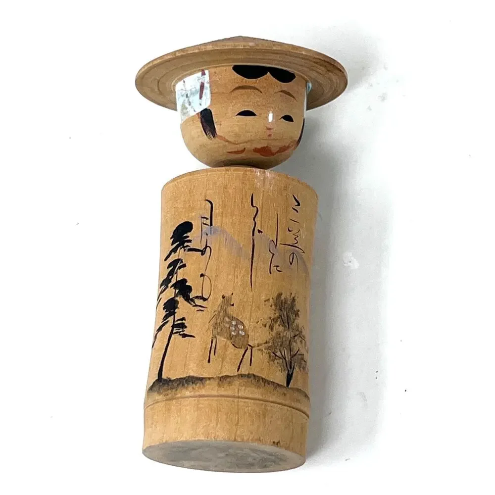Unbranded kokeshi dolls