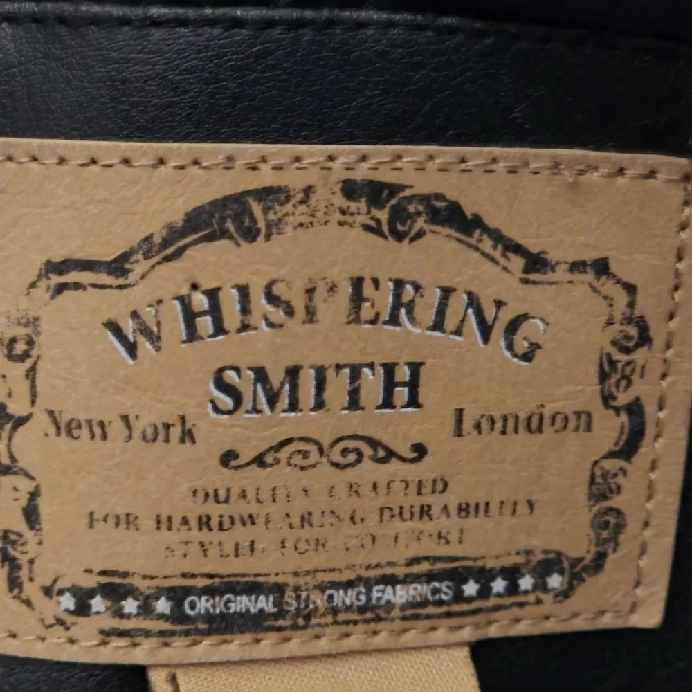 whispering smith stylish black