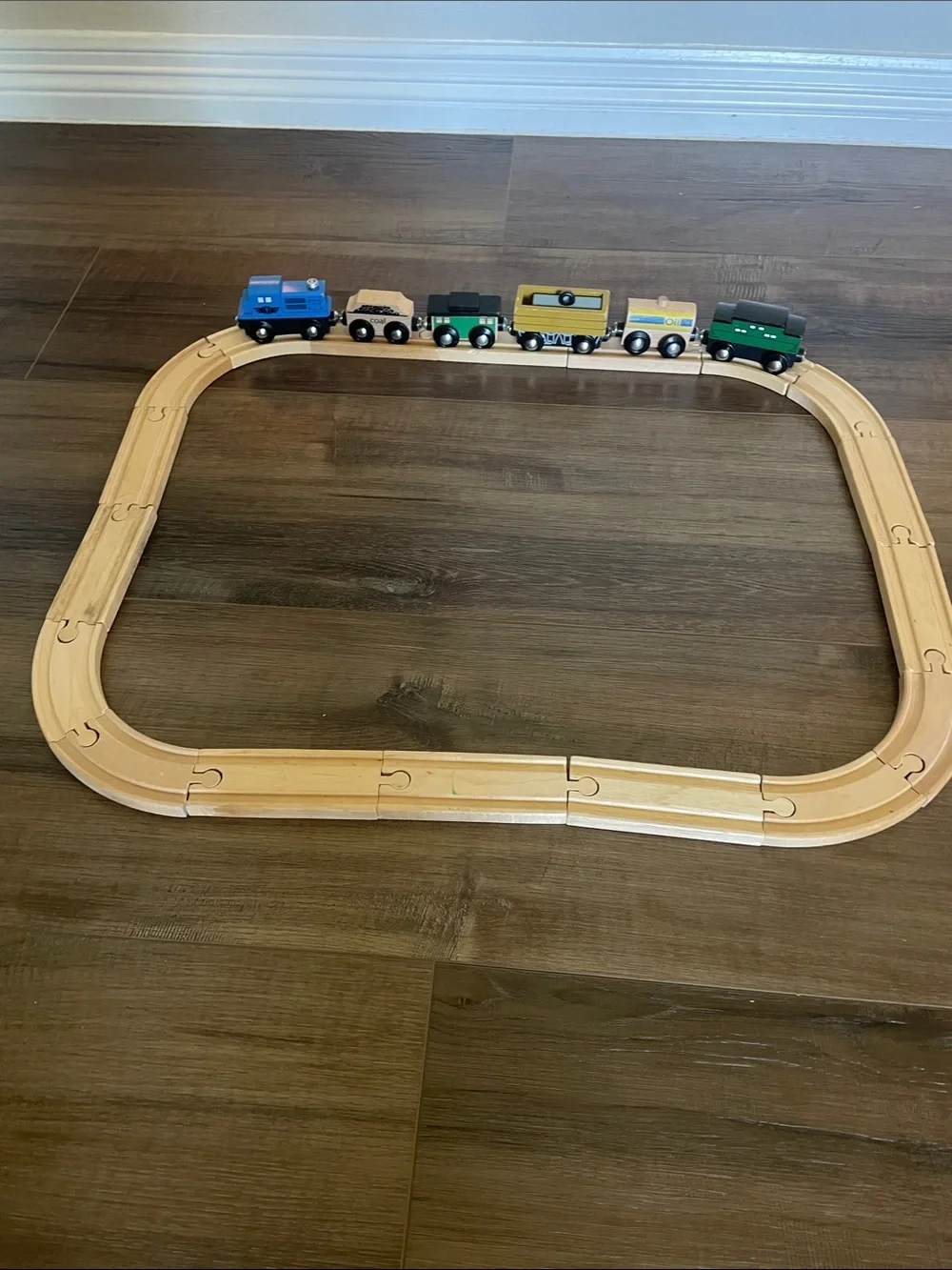 6 Small Wooden Train Cars and 19 pcs of track