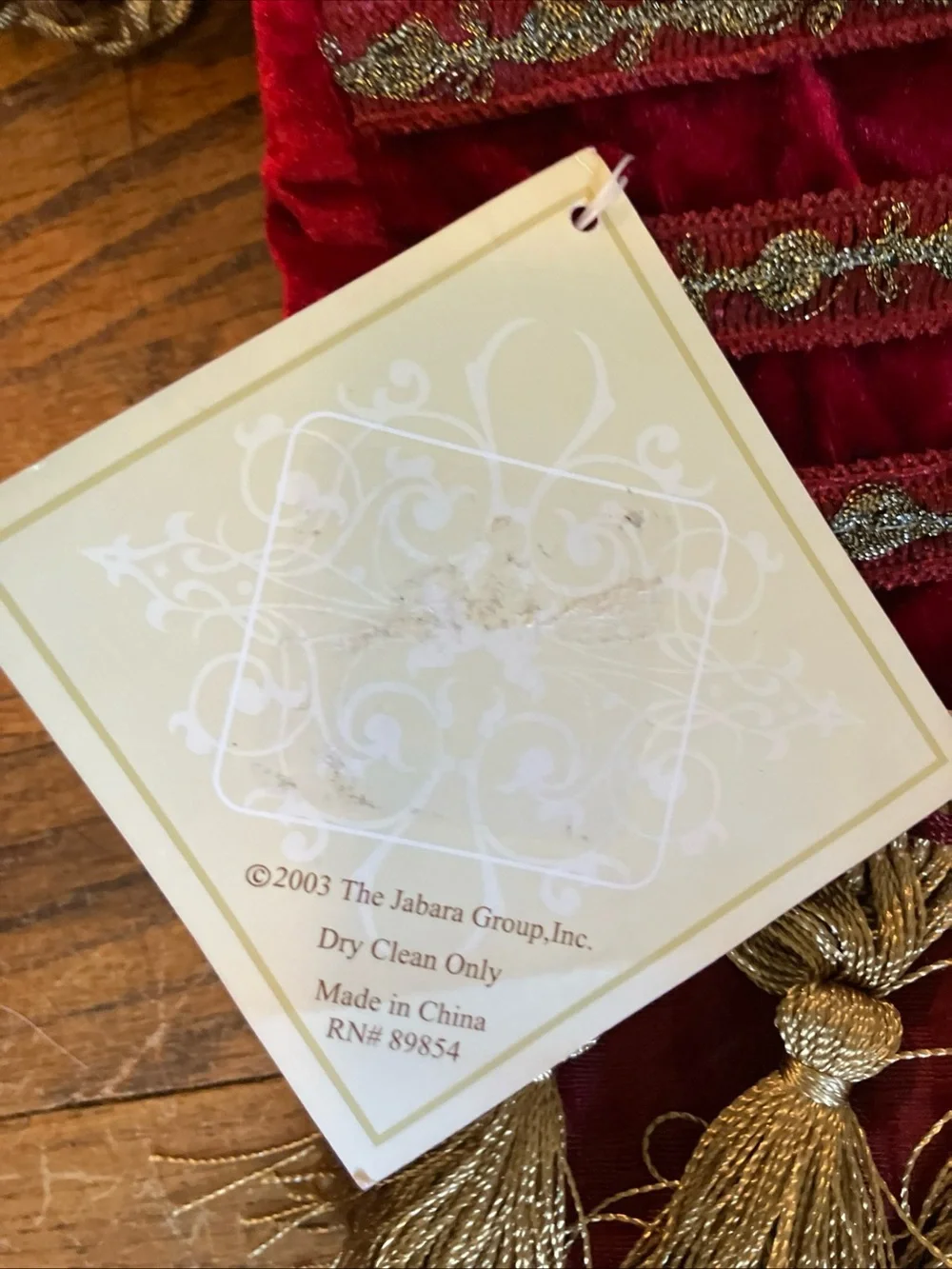 The Jabara Group burgundy velvet