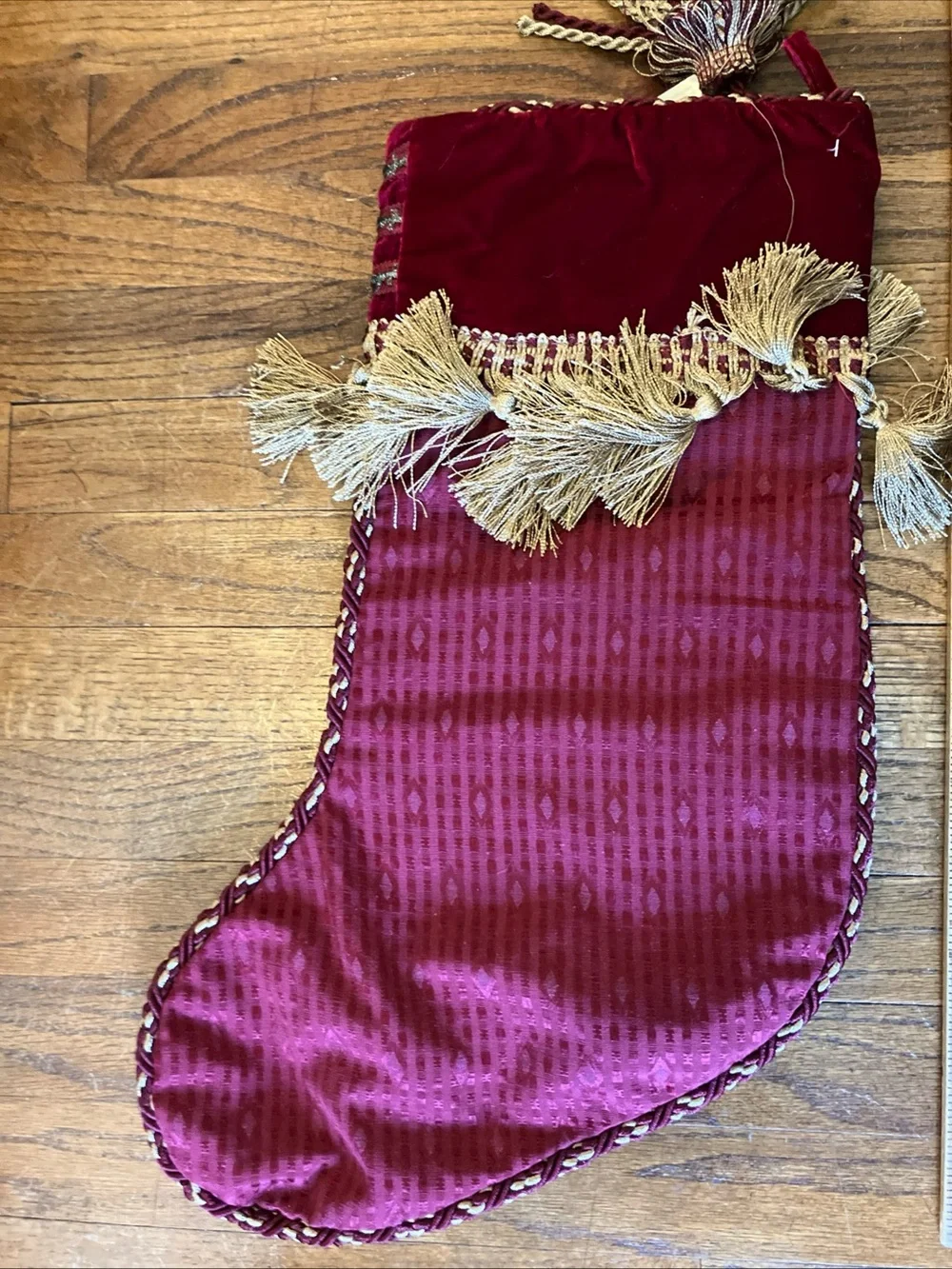 The Jabara Group burgundy velvet