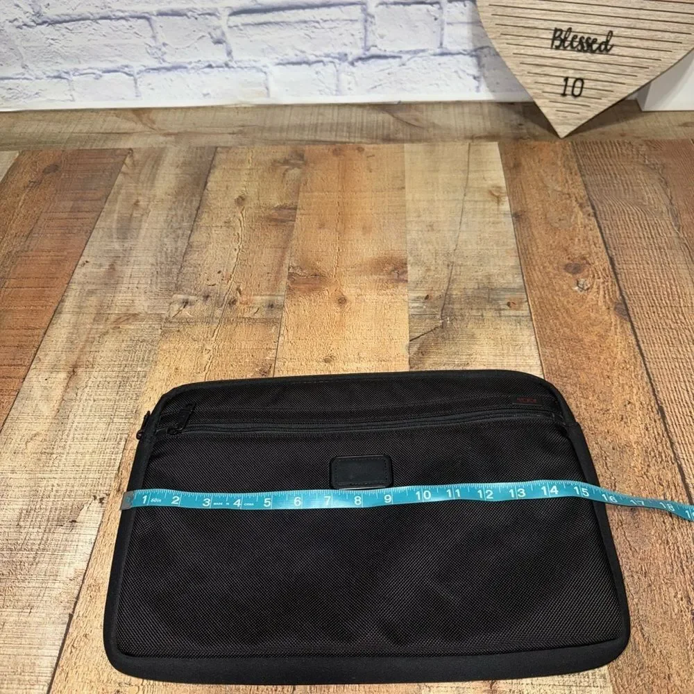 Tumi black laptop