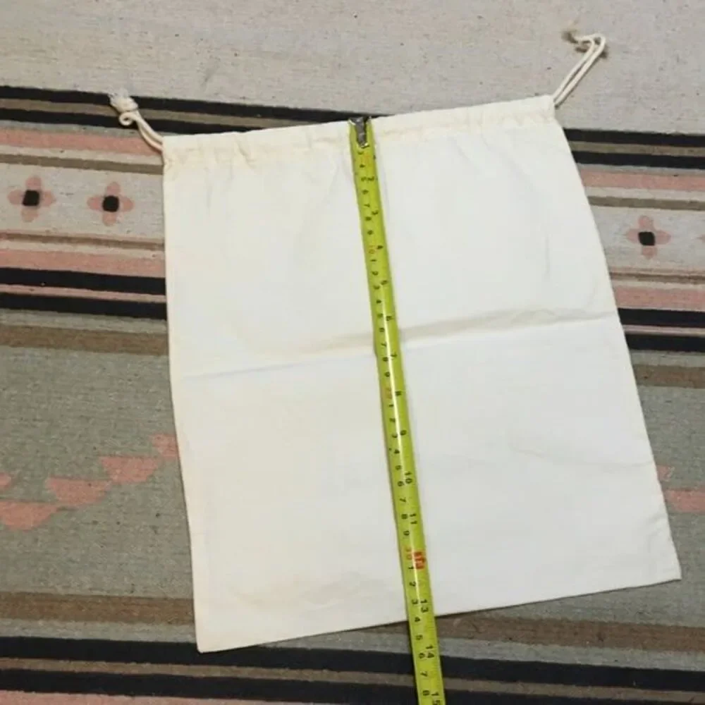 Johnny Was medium Off White drawstring dustbag logo on front Garment bag