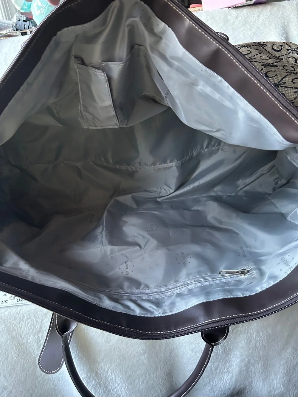CIAO! 22” duffle bag with faux leather handles buckle