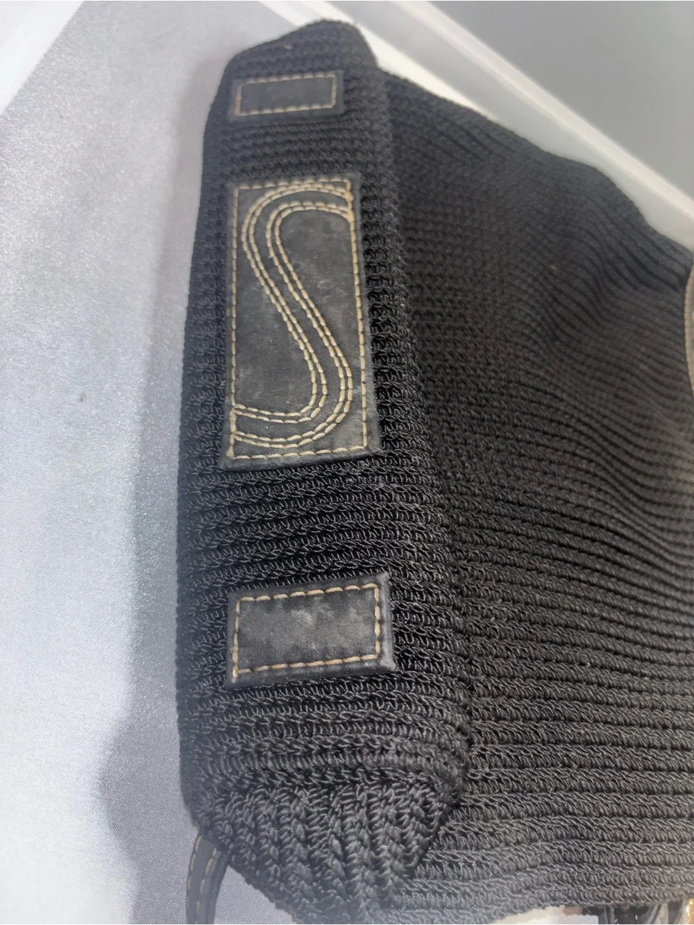 The Sak sleek black