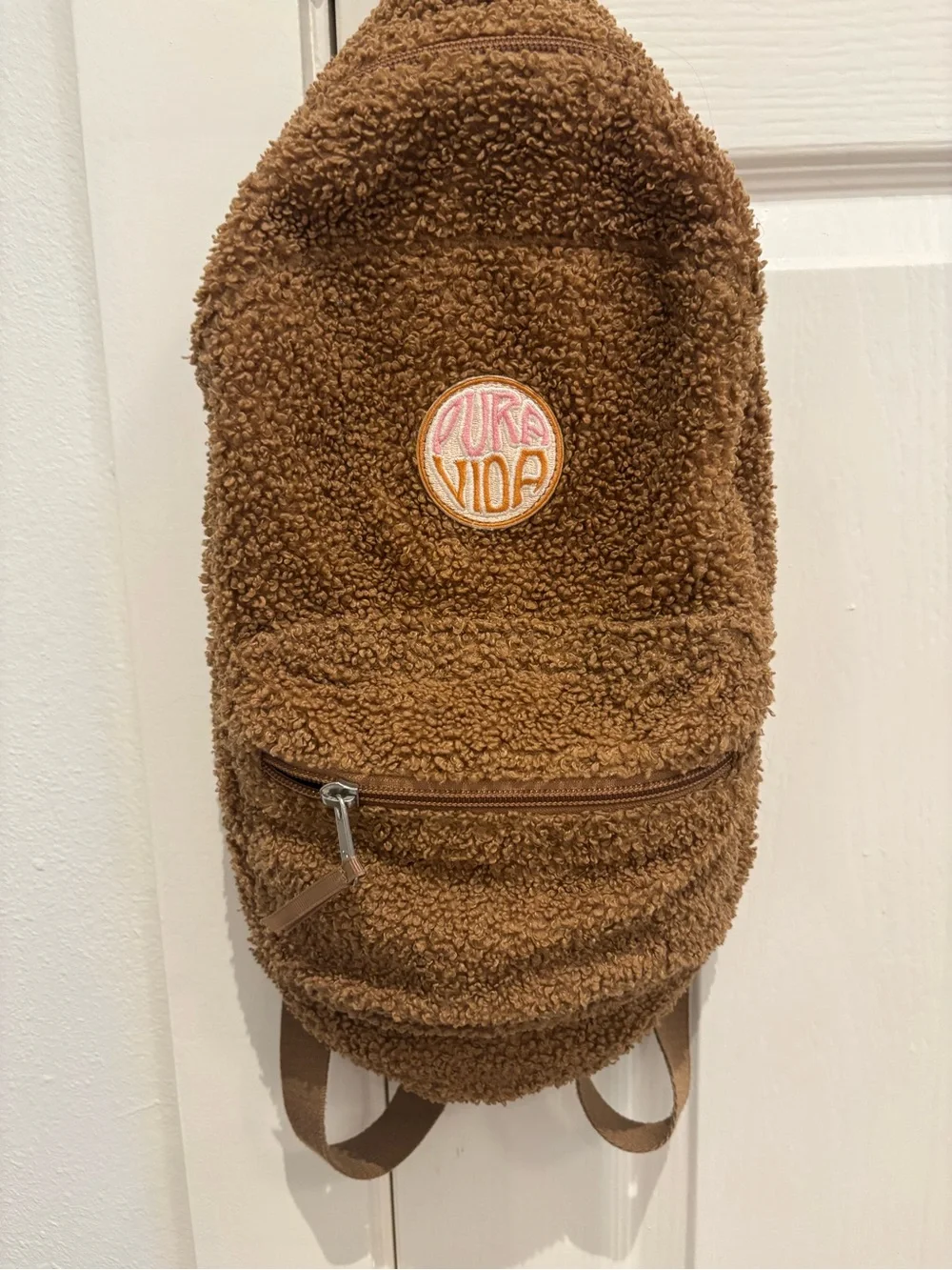 Pura Vida Kids Teddy Sherpa Sling Backpack in Brown with Pink/Yellow Patch