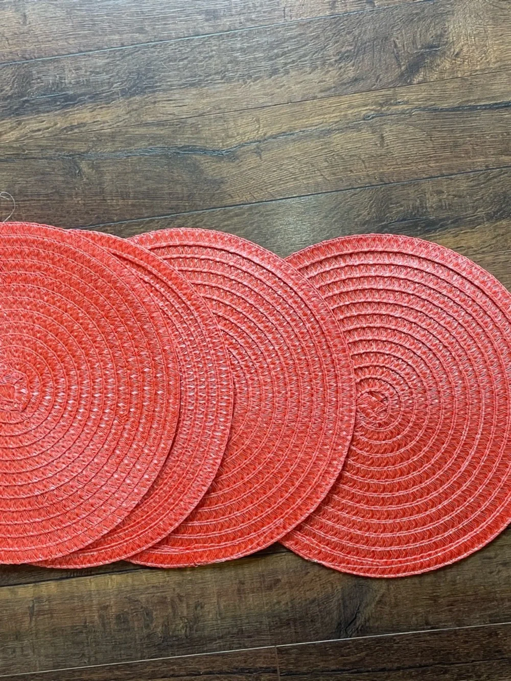 Home goods Set of Four Coral Round Woven Placemats NWOT New