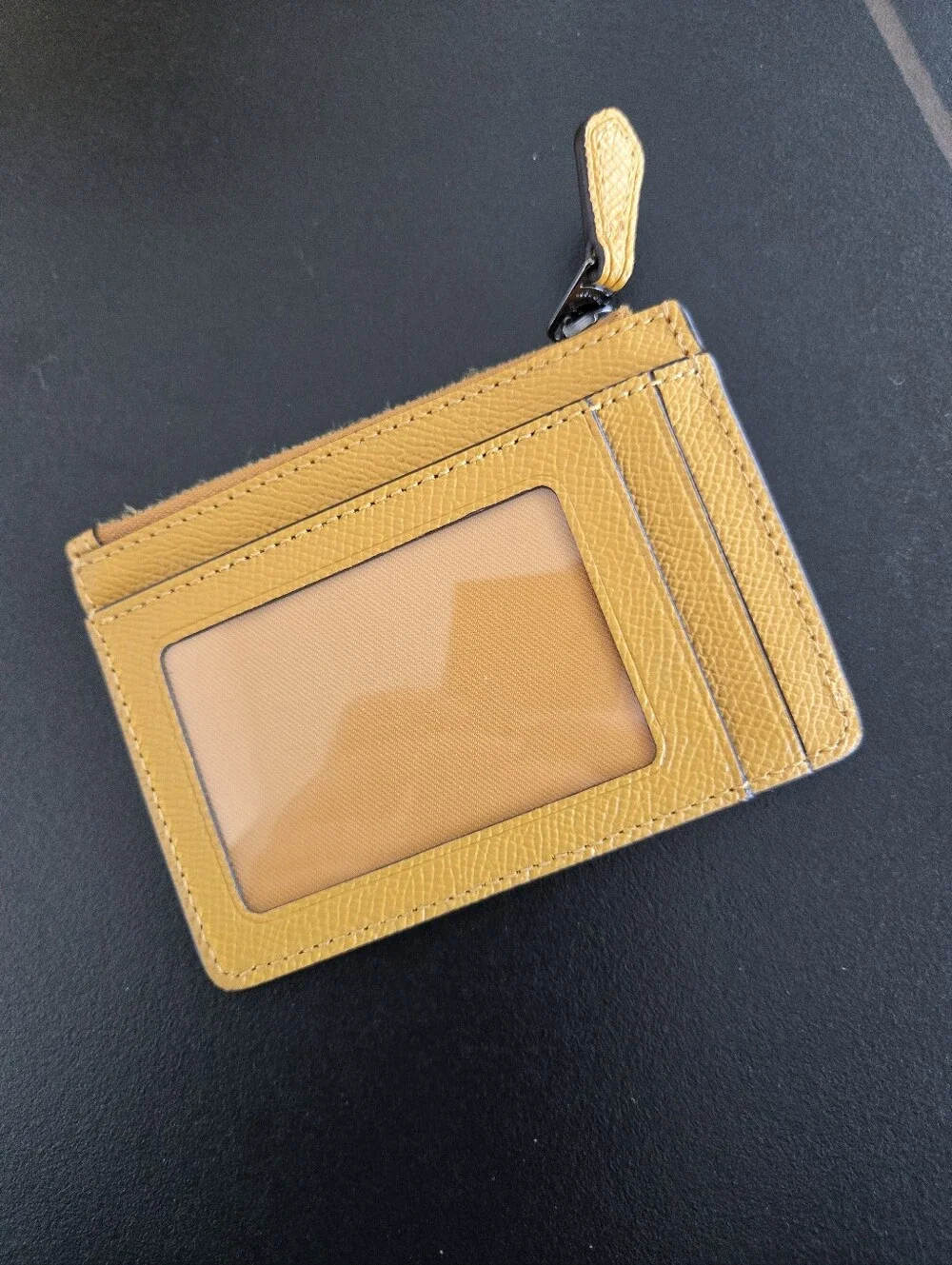 Coach slim zip