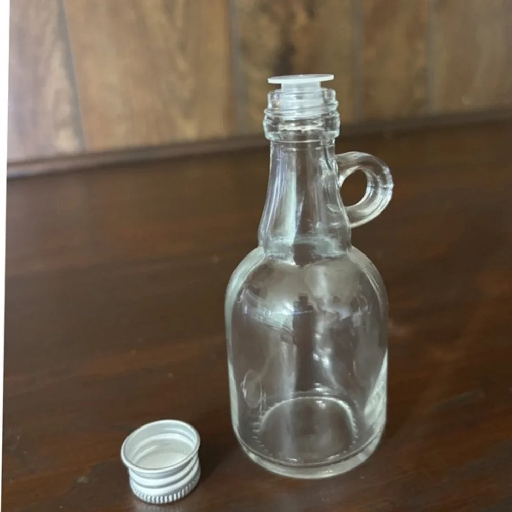 18 Pack Mini Glass Syrup Bottles with Handles and Screw Caps 4 Inch Clear Jugs