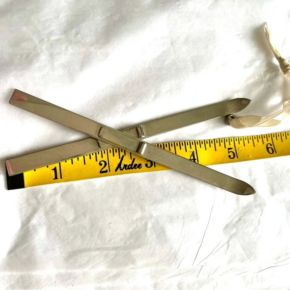 Restoration Hardware silver approximately skis