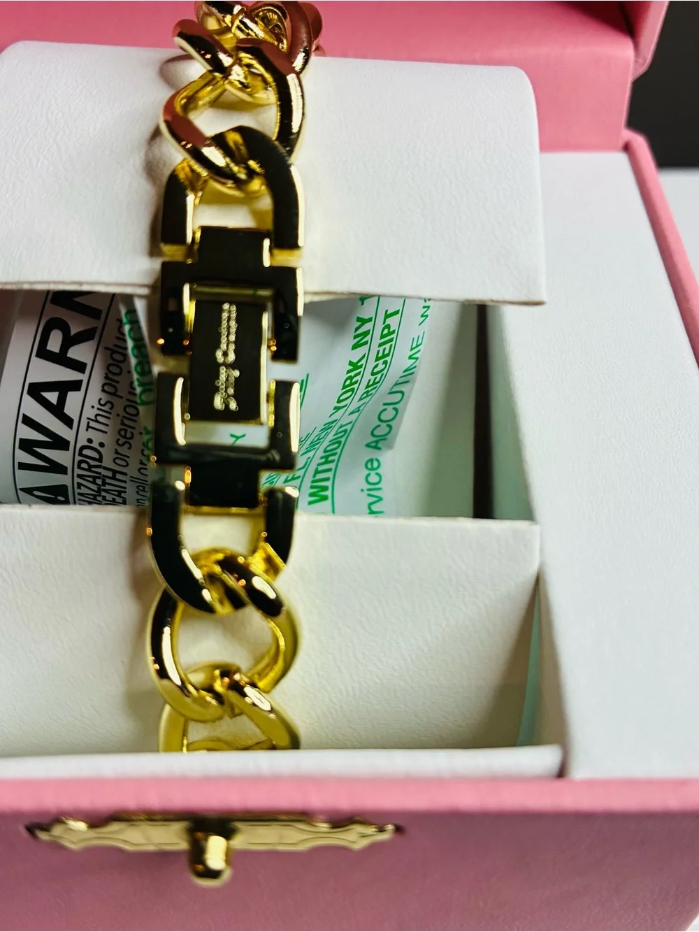 Juicy Couture gold tone