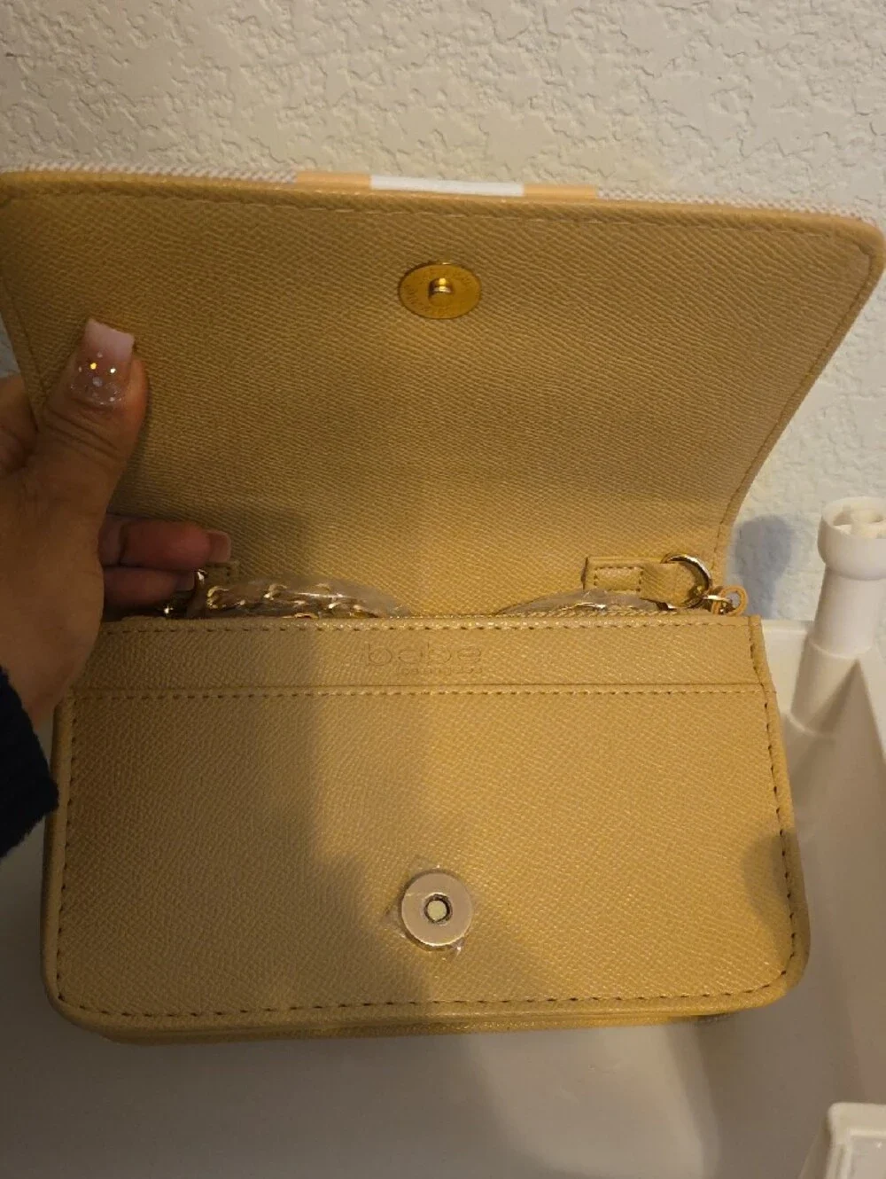 bebe structured clutch