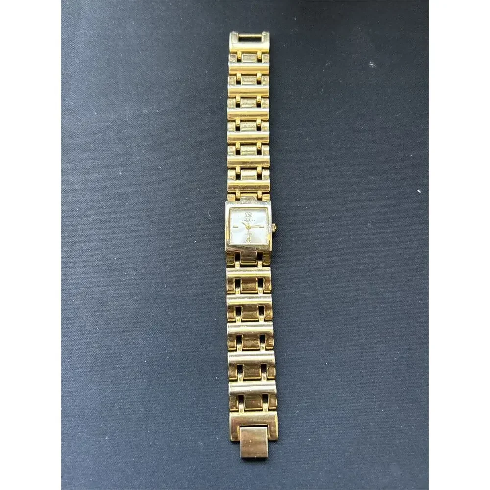 LA Express Silver Tone Dial Gold Tone Case And Band Women’s Quartz Watch