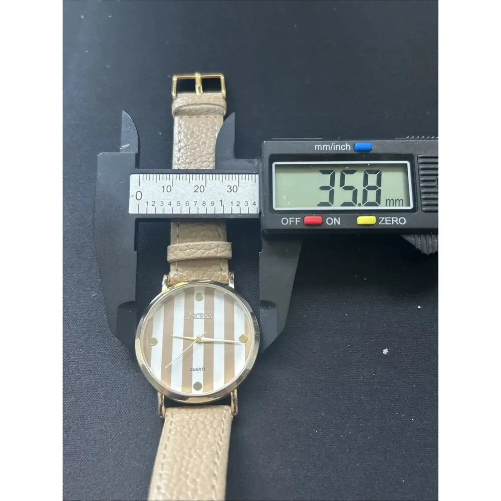 Decree gold tone