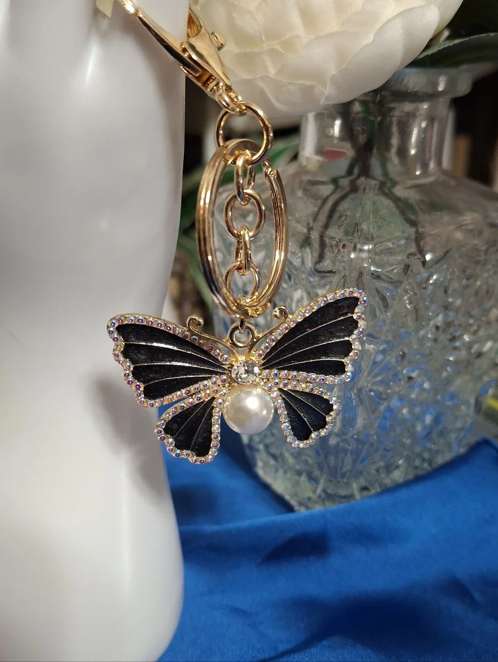 Gold Butterfly Keychain with Black Enamel and Pearl Accent