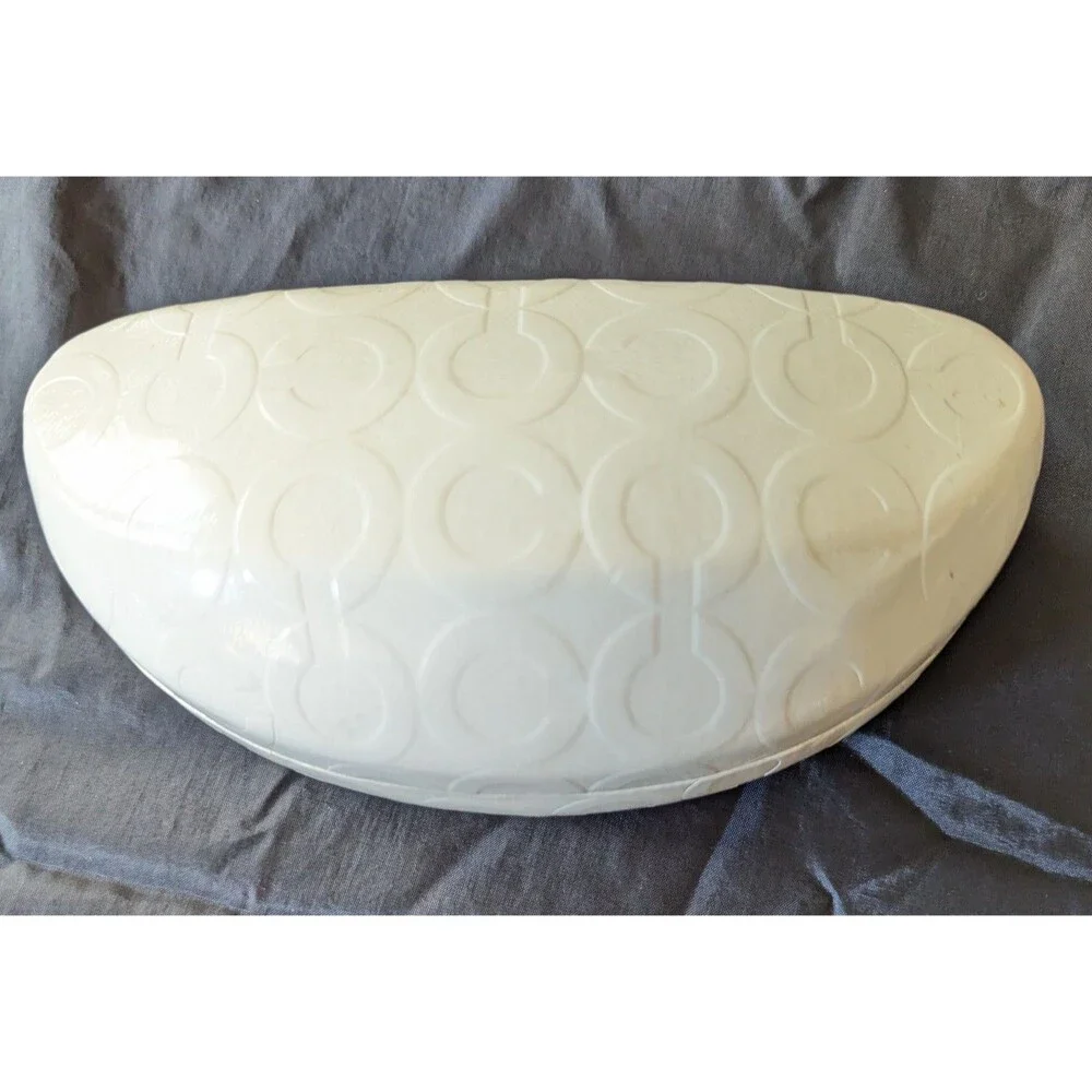 Coach signature embossed