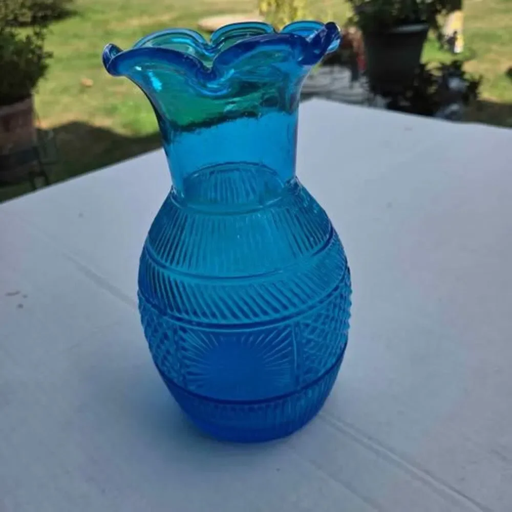 Vintage Clevenger Bros vase in light blue
