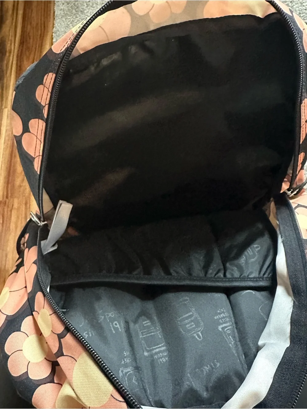 Jansport Black Backpack with Peach & yellow Floral Print
