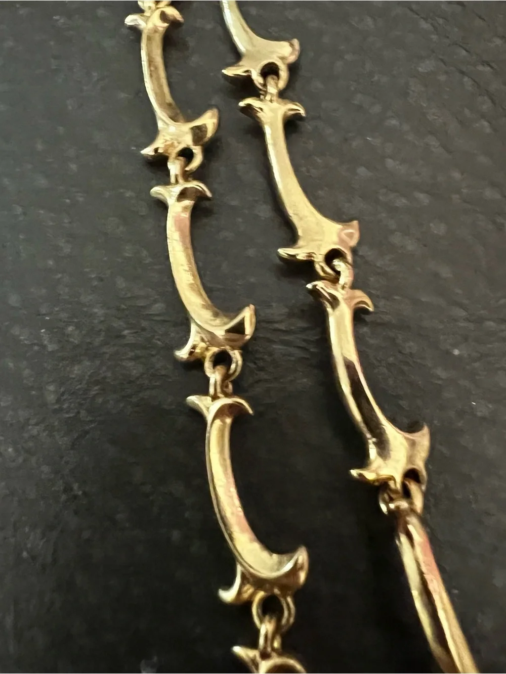 Avon gold tone
