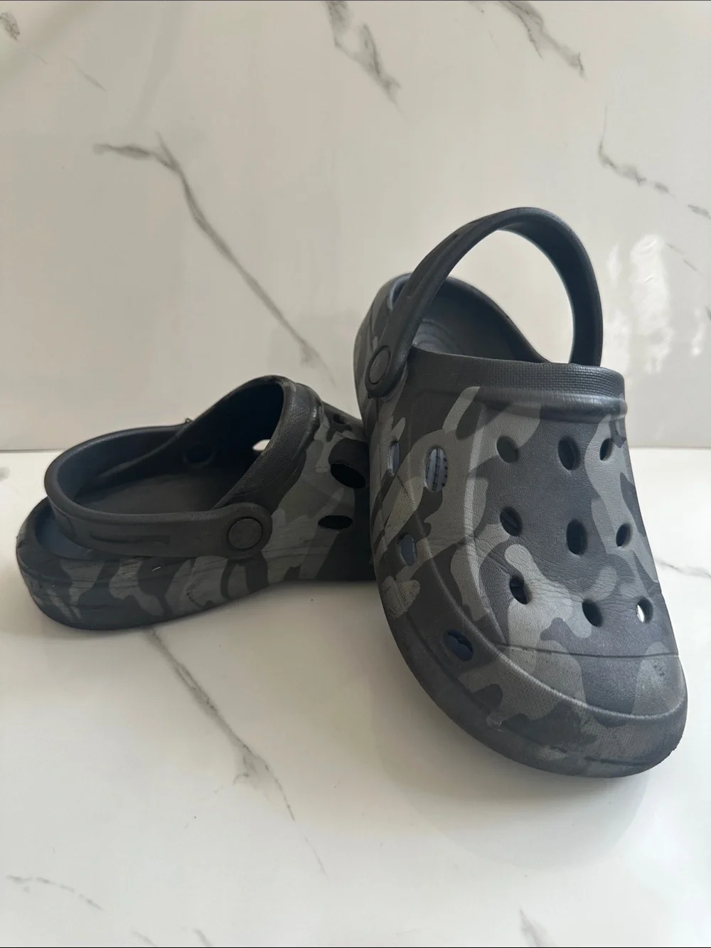 CROCS USED but still Good (has a hole but will be patched)