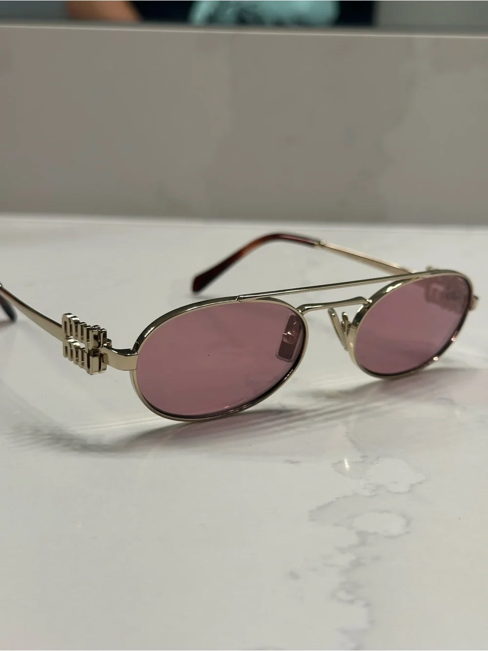 Miu Miu elegant gold