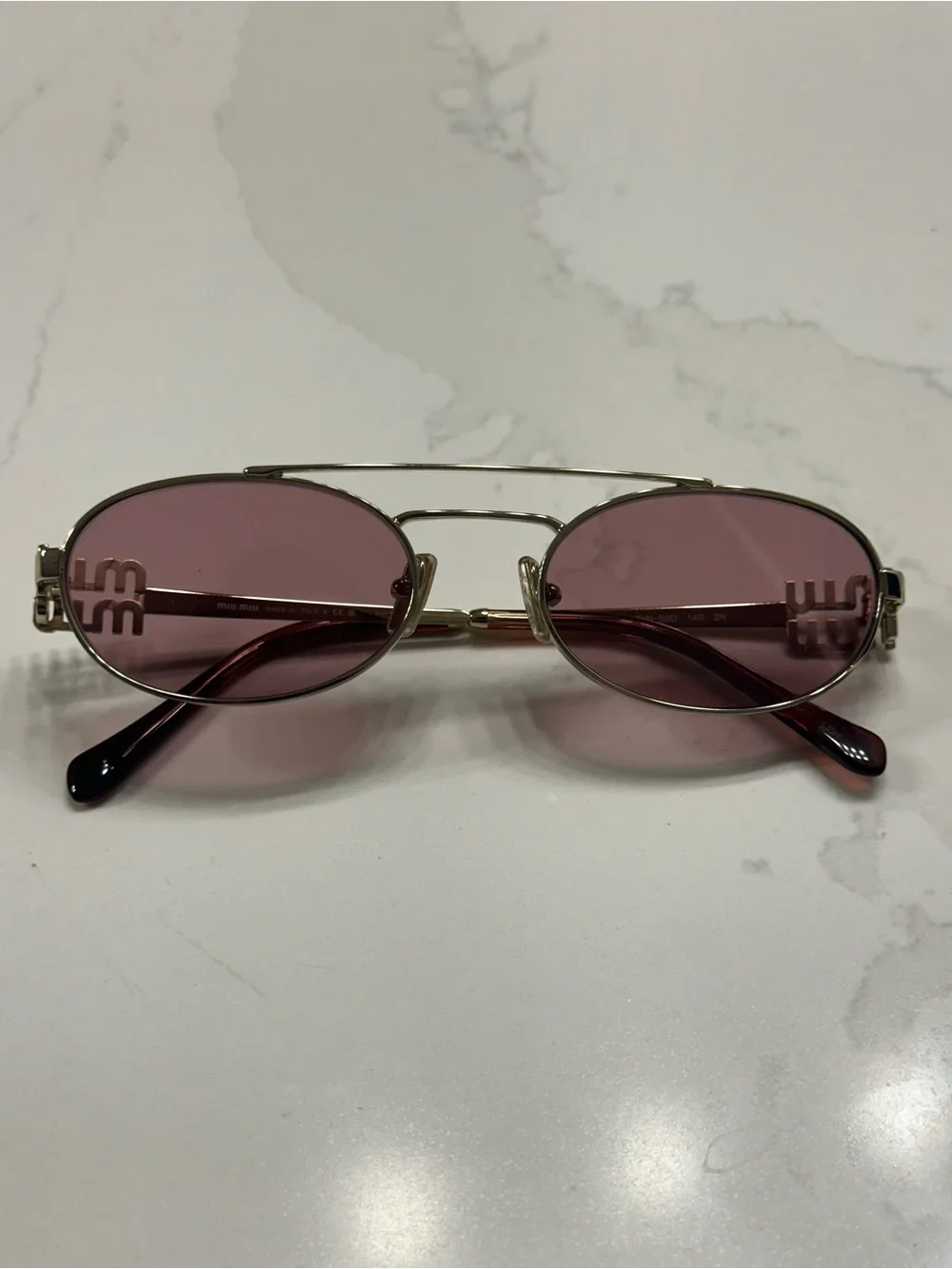 Miu Miu elegant gold