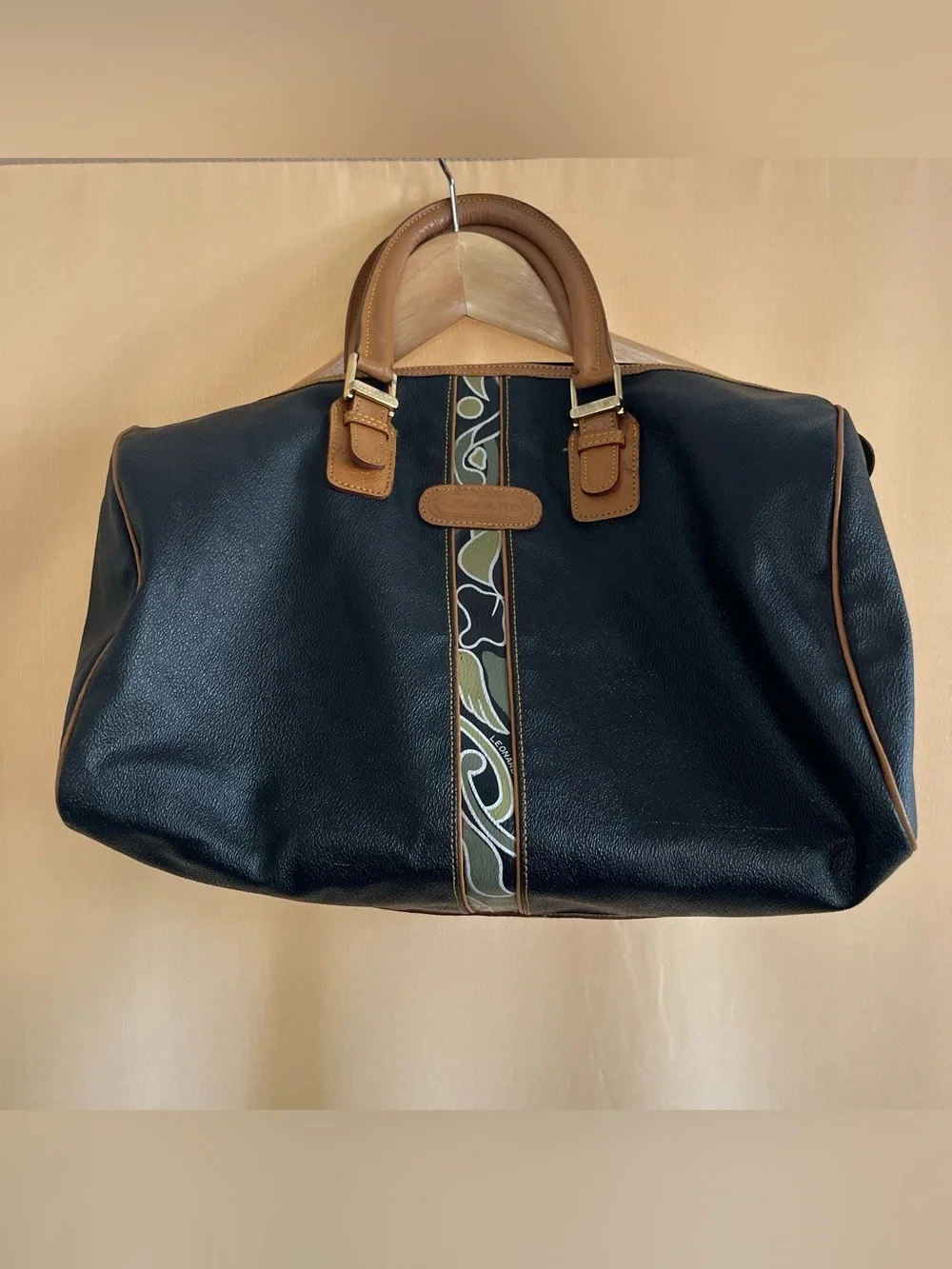 Black Leather Duffel Bag with Brown Trim and Olive Pattern Accent