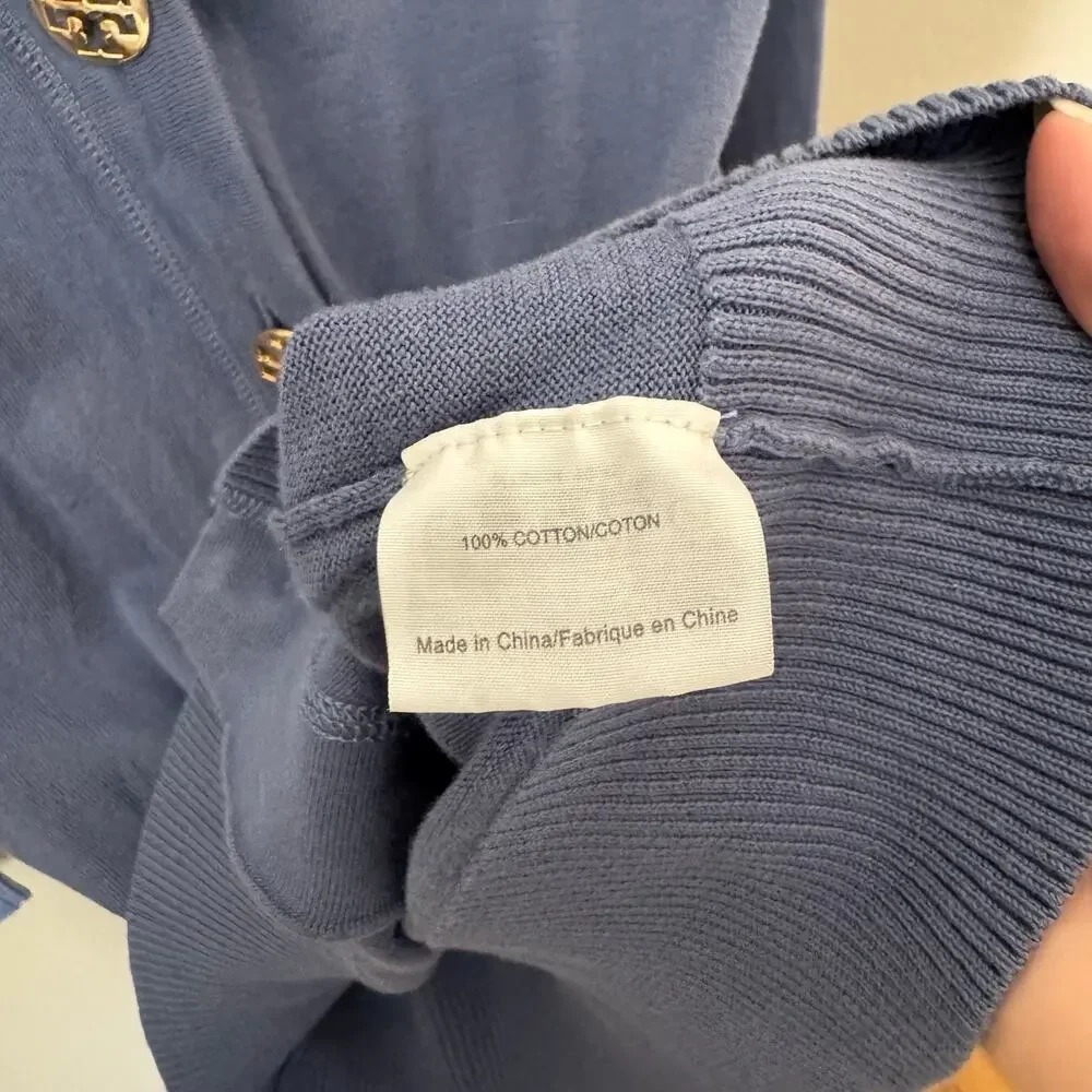 Tory Burch offers purple trades