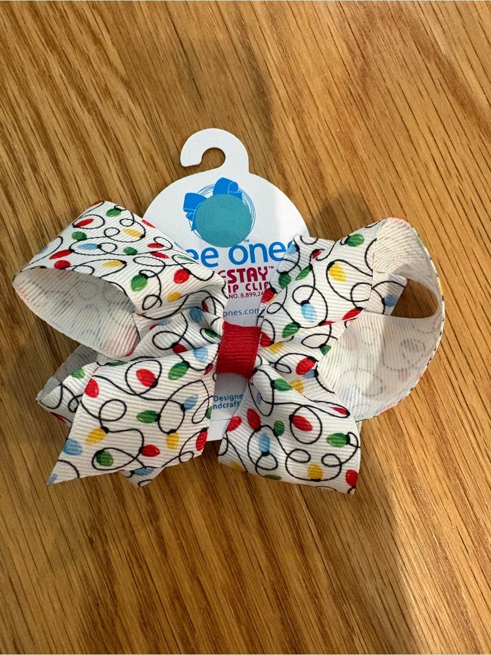 Wee Ones White Bow Clip with Multicolor Light Print and Red Center