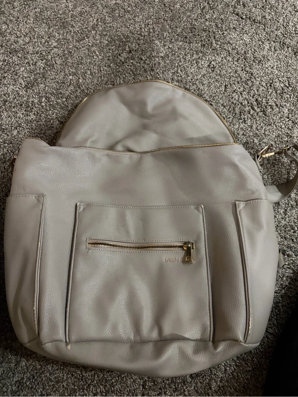 Fawn Design light cream leather backpack with gold hardware