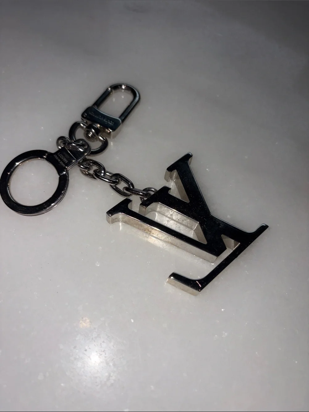 Louis Vuitton attach polished louis