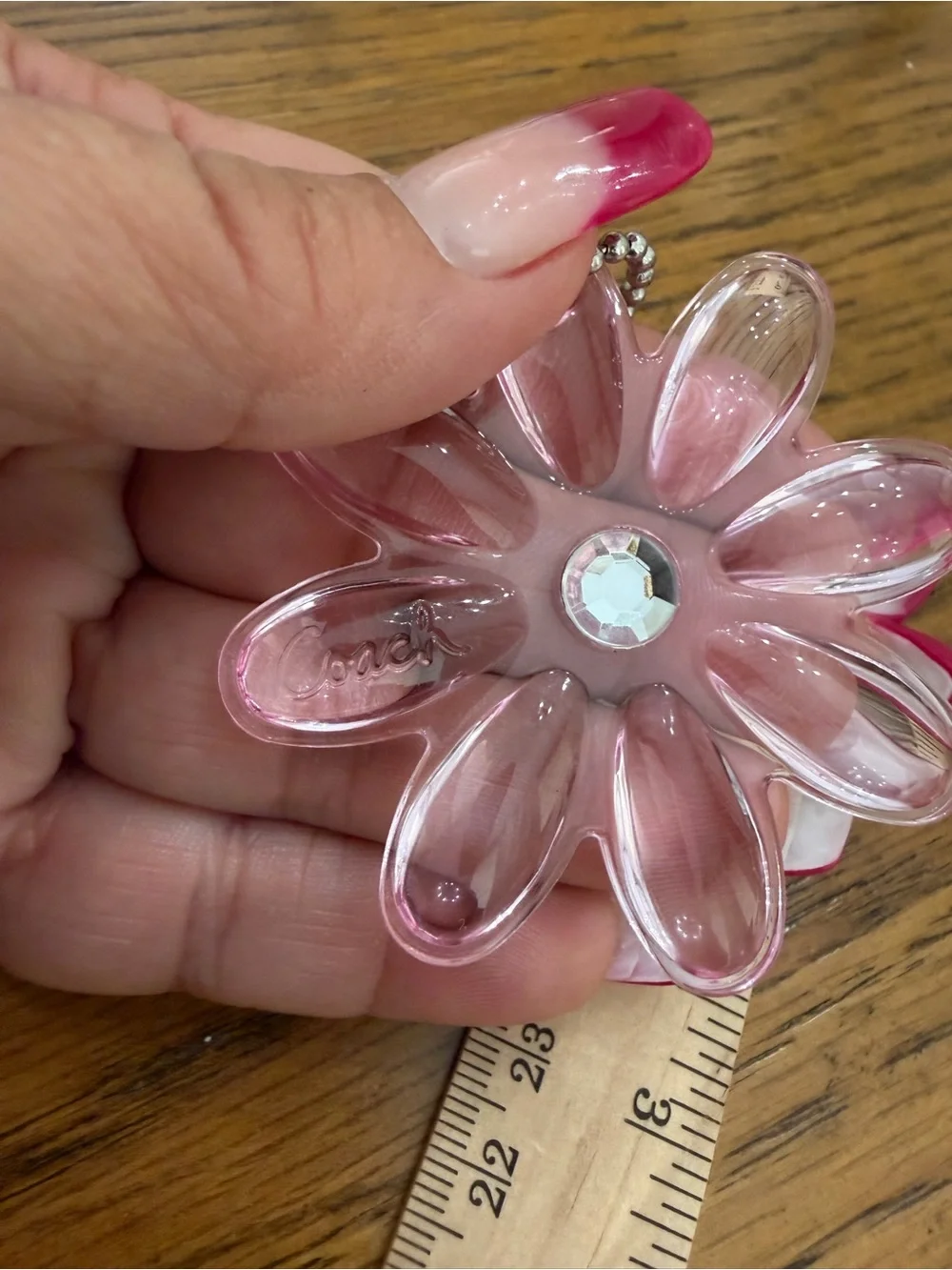Coach pink flower
