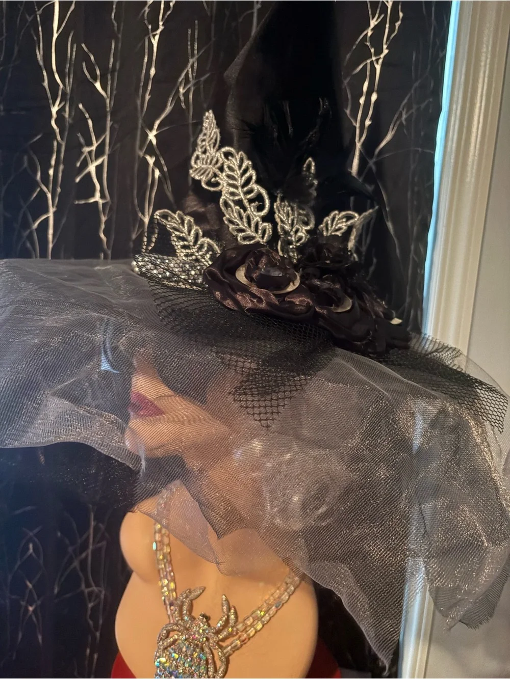 Elegant Black Witch Hat with Veil and Floral Accents unique embellishments
