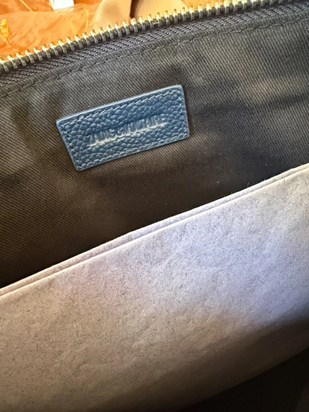 Zadig & Voltaire Navy Pebbled Leather Wristlet with Silver Wing Logo
